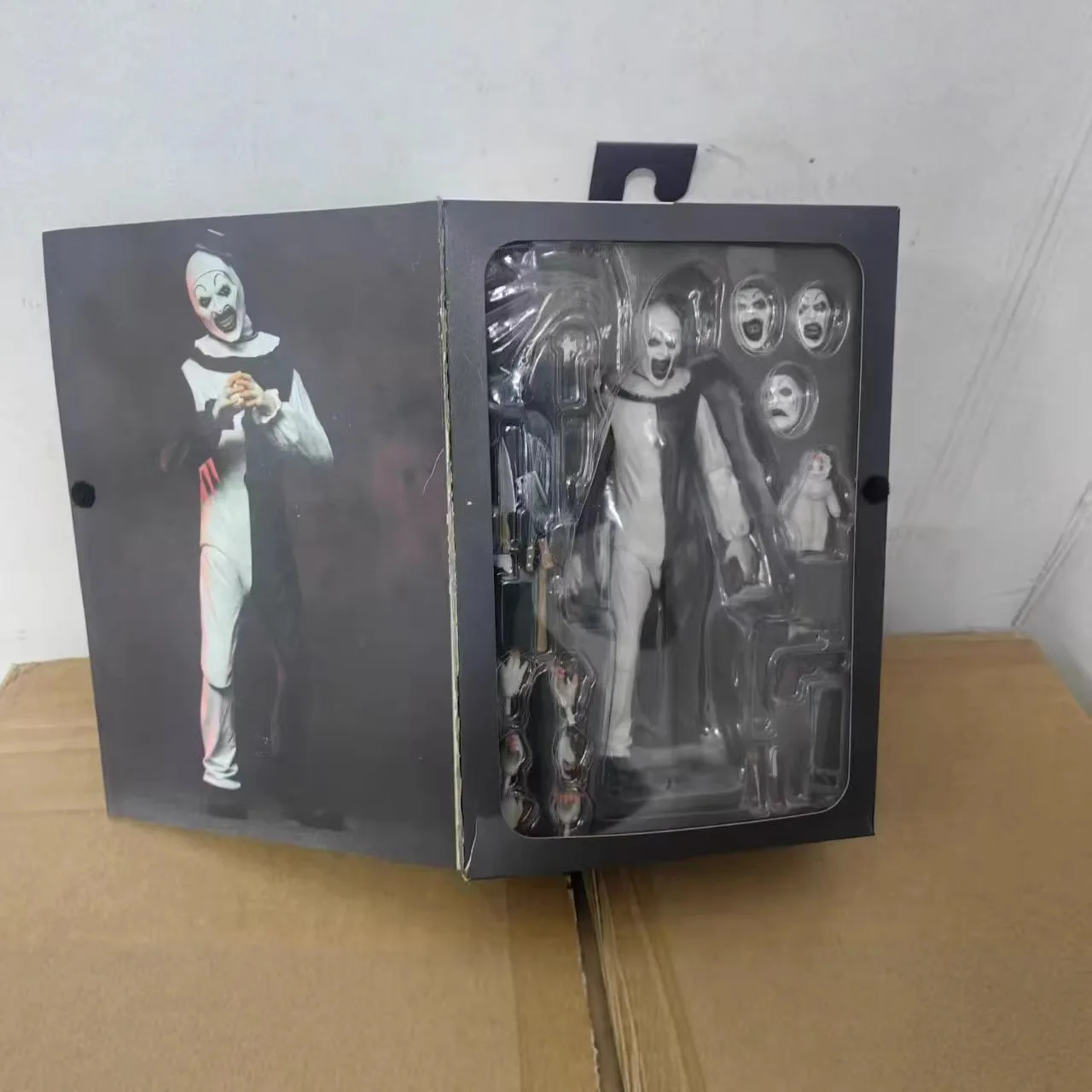 Neca 45251 Terrifier Art The Clown 7 Inch Articulated Action Figure Collectible With Interchangeable Heads Hands For Horror Fans