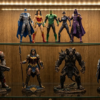 Collector shelf comparison of compact 6-inch figures and larger display figures